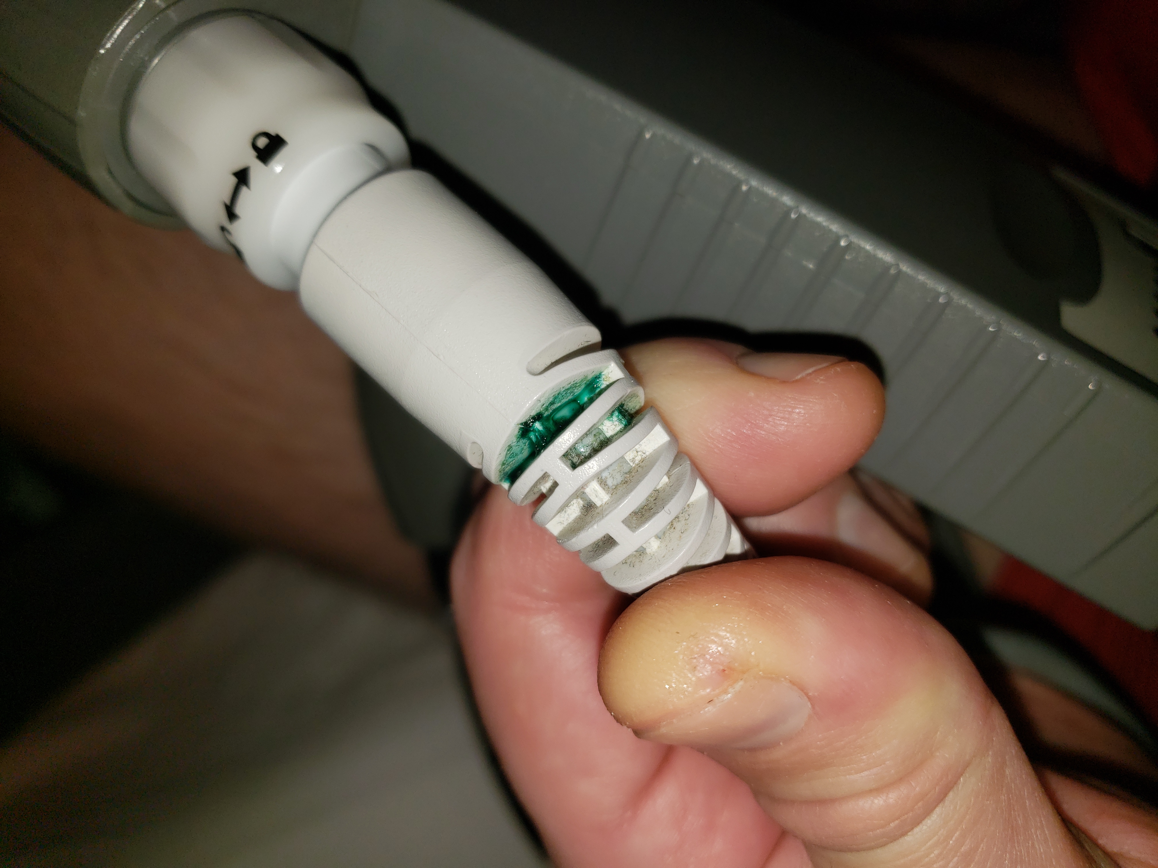 LVAD green substance on battery wire connectors